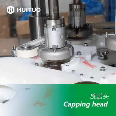 La bottiglia di vetro rotatoria automatica sciroppa la capsulatrice della macchina di Honey Twist Off Servo Capping