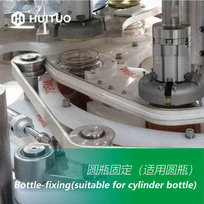 La bottiglia di vetro rotatoria automatica sciroppa la capsulatrice della macchina di Honey Twist Off Servo Capping